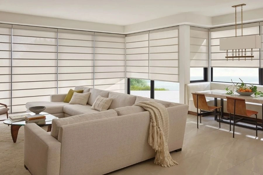 Elegant cream roman blinds in modern Dubai living room.
