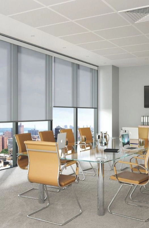 Modern grey roller blinds in Dubai office boardroom.
